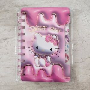 🔵🔴NWT Hello Kitty Sanrio Pink small spiral notebook with dividers. One size.